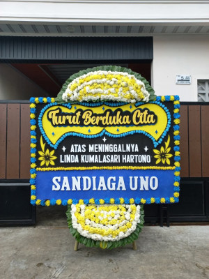 Papan Bunga Duka di Sario Utara