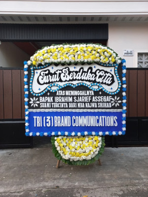 Papan Bunga Duka di Sario Utara